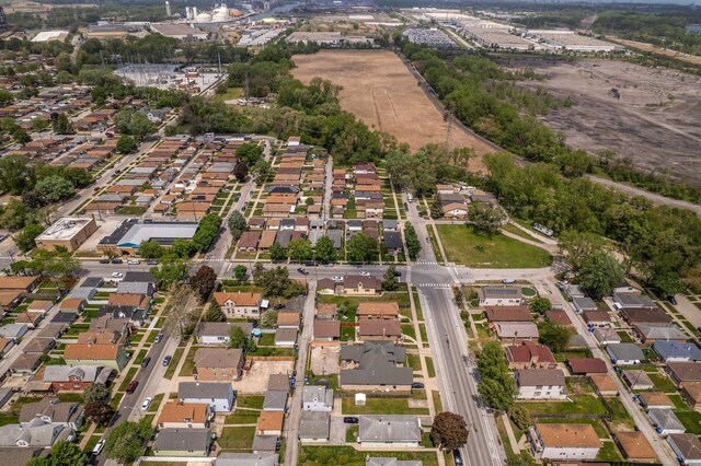 aerial view of property's location with nearby suburban area