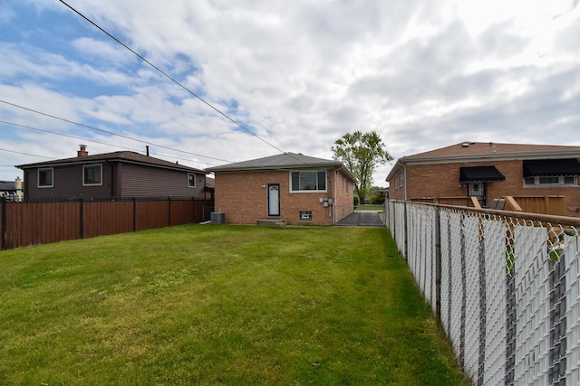 430 Marquette Ave, Calumet City, IL 60409 - view of yard featuring entry steps and central air condition unit