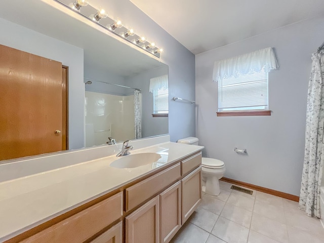 bathroom with toilet, tile patterned flooring, vanity, baseboards, and a shower with curtain
