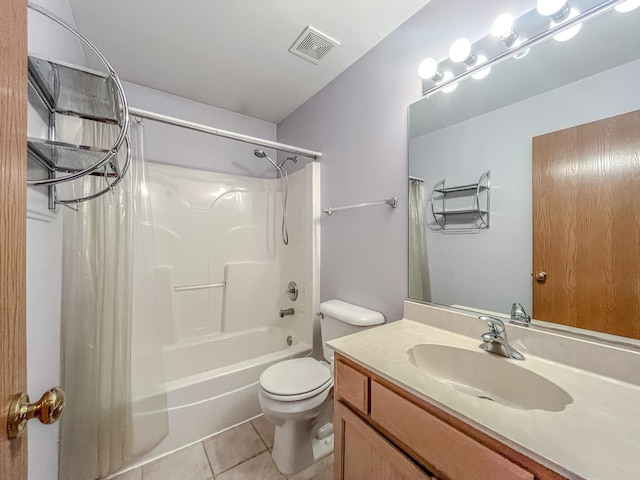 bathroom with tile patterned floors, toilet, vanity, and shower / bathtub combination with curtain