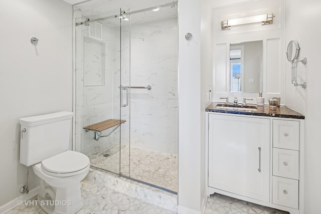 100 E Huron St Unit 4801, Chicago, IL 60611 - bathroom featuring toilet, marble look tile flooring, a marble finish shower, and vanity