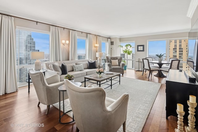 100 E Huron St Unit 4801, Chicago, IL 60611 - living room with hardwood / wood-style flooring, plenty of natural light, and ornamental molding