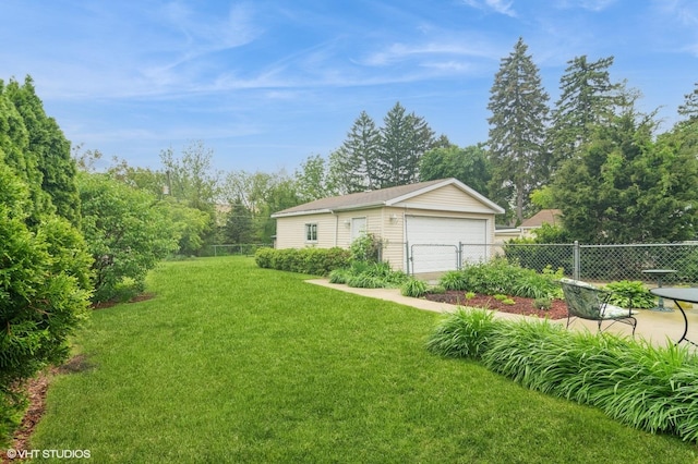 91 Fletcher Dr, Des Plaines, IL 60016 - view of yard featuring a garage and an outbuilding