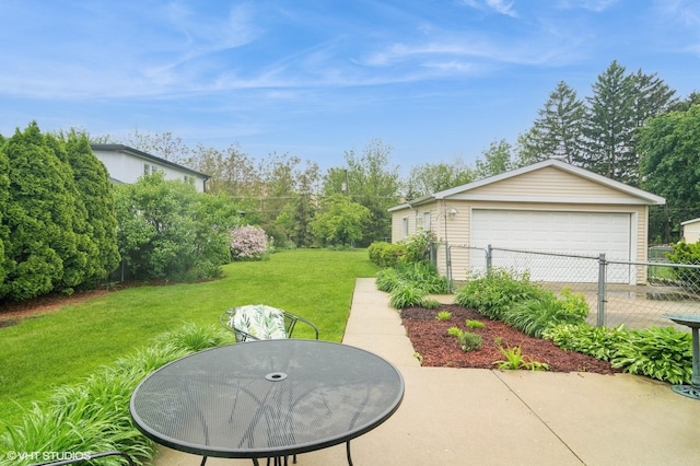 91 Fletcher Dr, Des Plaines, IL 60016 - view of yard with a garage and an outbuilding