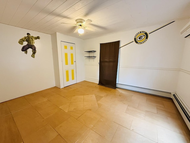 204 N Center St, Colfax, IL 61728 - empty room featuring ceiling fan, a baseboard heating unit, a baseboard radiator, and a wall unit AC