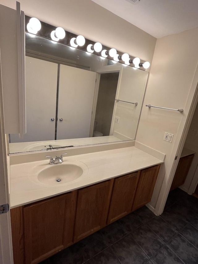 5200 S Ellis Ave Unit 202N, Chicago, IL 60615 - bathroom with tile patterned floors, vanity, and toilet
