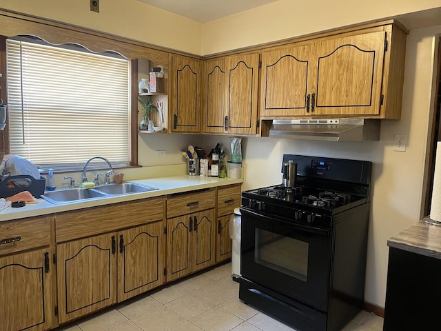 2256 S 15th Ave, North Riverside, IL 60546 - kitchen featuring black gas range oven, under cabinet range hood, a sink, brown cabinets, and light countertops