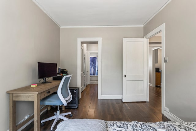 408 N Prairie St Unit 3, Champaign, IL 61820 - bedroom featuring ornamental molding, dark wood-type flooring, baseboards, and a desk