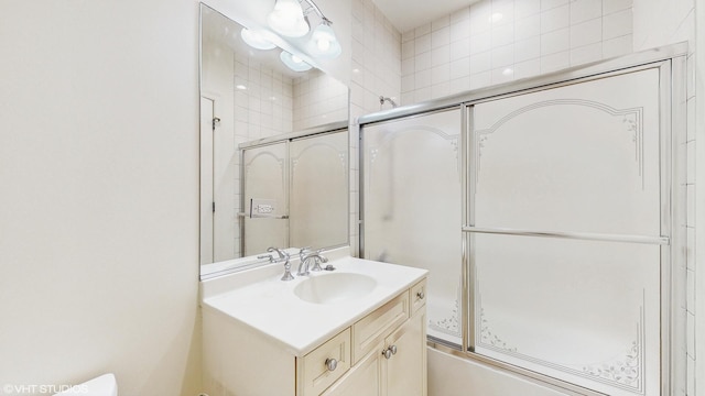 1416 S Emerald Ave, Chicago, IL 60607 - full bathroom featuring vanity, shower / bath combination with glass door, and toilet
