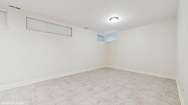 1416 S Emerald Ave, Chicago, IL 60607 - empty room featuring baseboards and tile patterned floors