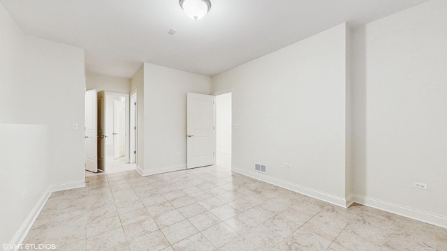 1416 S Emerald Ave, Chicago, IL 60607 - spare room with baseboards