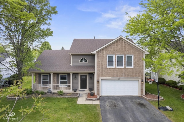 337 Aristocrat Dr, Bolingbrook, IL 60490 - view of front facade with an attached garage, a porch, driveway, and brick siding