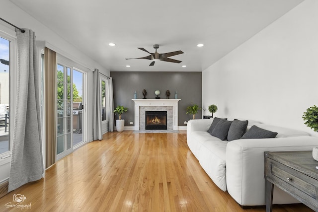 337 Aristocrat Dr, Bolingbrook, IL 60490 - living room featuring ceiling fan, light wood-style floors, a fireplace with flush hearth, and recessed lighting