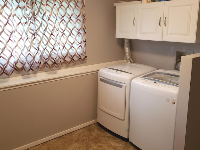 1020 Woodside Dr, Roselle, IL 60172 - laundry area with cabinet space and washing machine and dryer