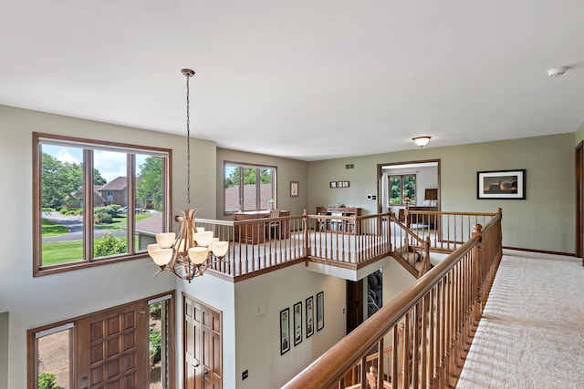 1224 Barclay Cir, Inverness, IL 60010 - corridor featuring a chandelier, an upstairs landing, carpet flooring, and baseboards