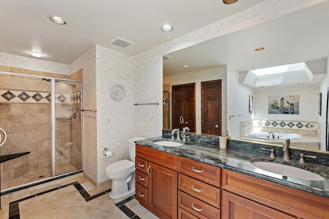 1224 Barclay Cir, Inverness, IL 60010 - full bath featuring tile patterned floors, a skylight, a shower stall, toilet, and double vanity