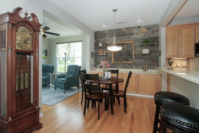 12370 Russet Ln, Huntley, IL 60142 - dining area featuring light wood-style flooring and ceiling fan