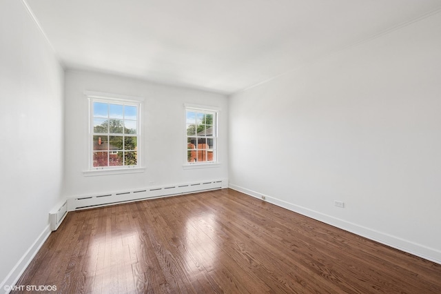 2222 Central St Unit 3, Evanston, IL 60201 - unfurnished room with wood finished floors, baseboard heating, and baseboards