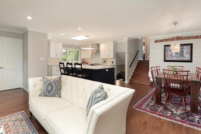 1706 Elm Ave, Northbrook, IL 60062 - living room with dark wood finished floors, ornamental molding, stairway, and recessed lighting