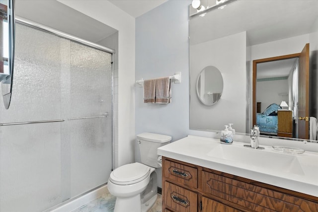 620 W 58th St, Westmont, IL 60559 - ensuite bathroom with a shower stall, toilet, vanity, and marble look tile flooring