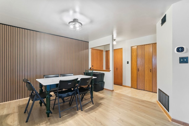11015 S Theresa Cir Unit 3C, Palos Hills, IL 60465 - dining space featuring light wood-style floors and baseboards