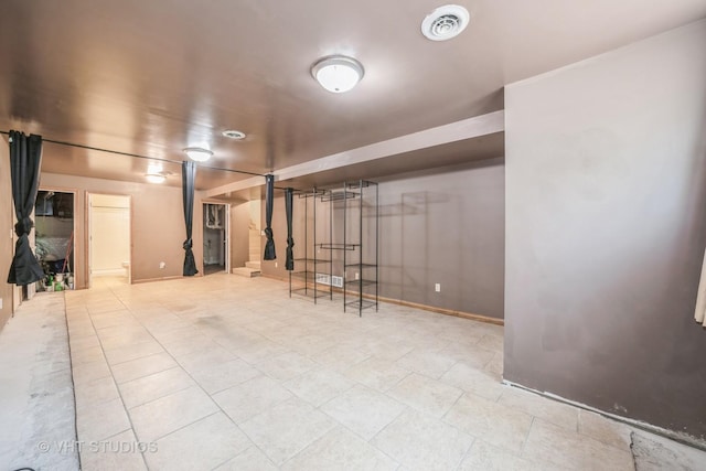 880 Marcella Rd, Merrillville, IN 46410 - finished basement with baseboards and tile patterned floors