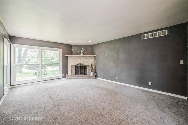 880 Marcella Rd, Merrillville, IN 46410 - unfurnished living room featuring carpet flooring, baseboards, a fireplace, and recessed lighting