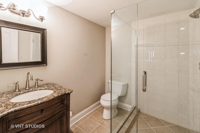 4111 Douglas Rd, Downers Grove, IL 60515 - bathroom with toilet, a stall shower, vanity, baseboards, and tile patterned floors