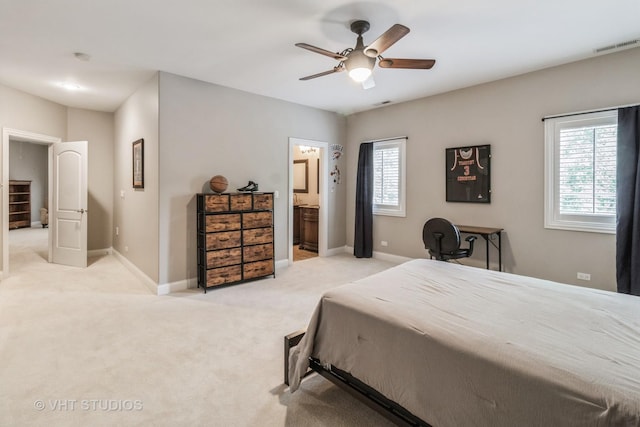 4111 Douglas Rd, Downers Grove, IL 60515 - bedroom with light colored carpet, baseboards, ensuite bath, and ceiling fan