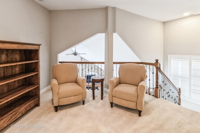 4111 Douglas Rd, Downers Grove, IL 60515 - living area featuring light colored carpet, a ceiling fan, healthy amount of natural light, and an upstairs landing