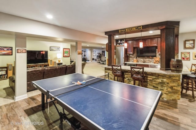 4111 Douglas Rd, Downers Grove, IL 60515 - game room with wood finished floors, bar area, and recessed lighting