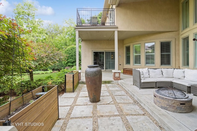 4111 Douglas Rd, Downers Grove, IL 60515 - view of patio with a balcony and an outdoor living space with a fire pit