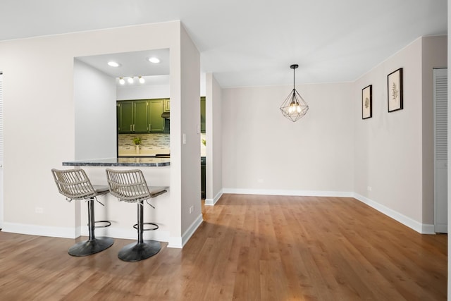 812 N River Rd Unit 3B, Mount Prospect, IL 60056 - unfurnished dining area featuring wood finished floors, baseboards, and recessed lighting