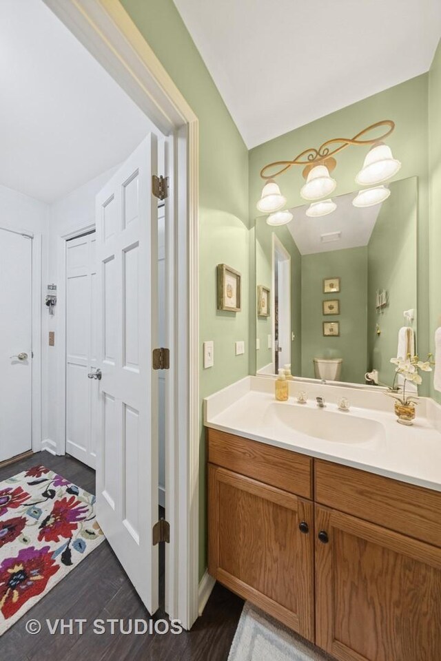 2260 Brookside Ct, Aurora, IL 60502 - bathroom featuring vanity, wood finished floors, and toilet