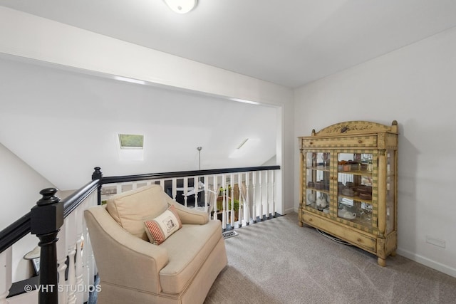 2260 Brookside Ct, Aurora, IL 60502 - sitting room featuring carpet, baseboards, and an upstairs landing