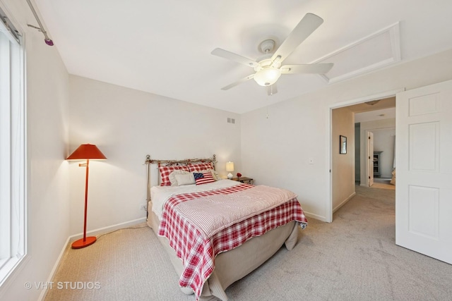 2260 Brookside Ct, Aurora, IL 60502 - carpeted bedroom featuring attic access, baseboards, and ceiling fan