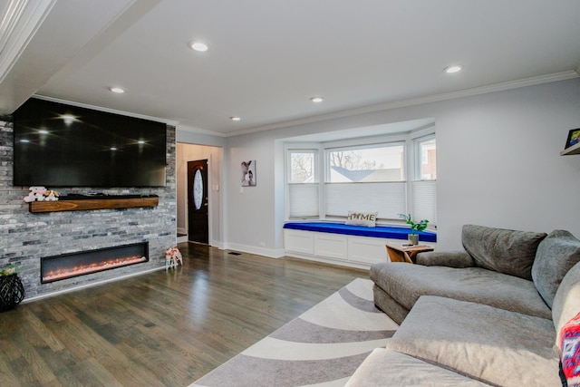 3356 N New England Ave, Chicago, IL 60634 - living area featuring ornamental molding, a stone fireplace, wood finished floors, recessed lighting, and baseboards