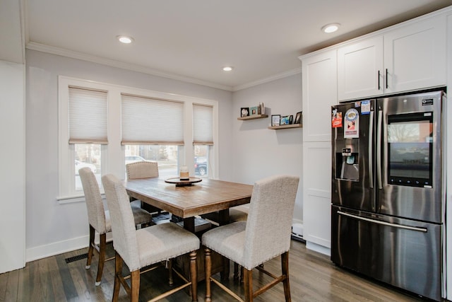 3356 N New England Ave, Chicago, IL 60634 - dining room with dark wood-style flooring, ornamental molding, recessed lighting, and baseboards