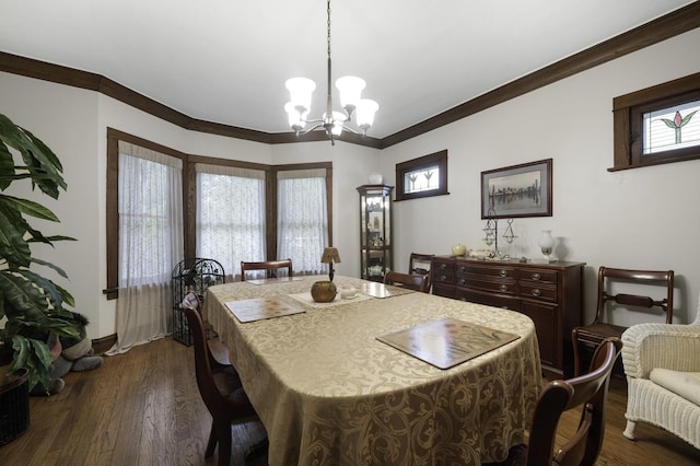 516 Clinton Ave, Oak Park, IL 60304 - dining room featuring a chandelier, dark wood finished floors, and crown molding