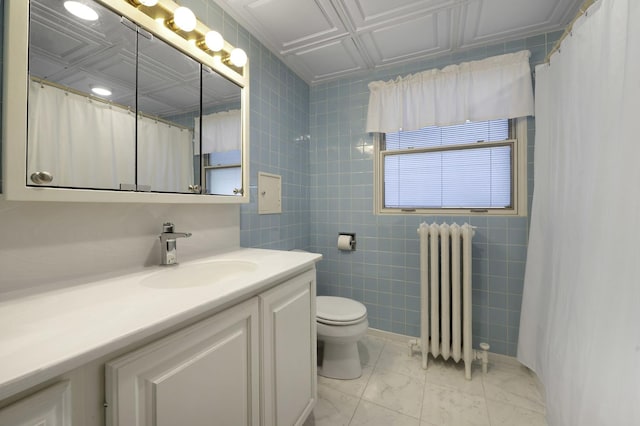 516 Clinton Ave, Oak Park, IL 60304 - bathroom featuring radiator heating unit, vanity, marble look tiles, tile walls, and a shower with shower curtain
