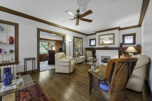 516 Clinton Ave, Oak Park, IL 60304 - living room with a ceiling fan, ornamental molding, wood finished floors, healthy amount of natural light, and a fireplace
