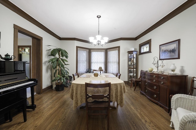 516 Clinton Ave, Oak Park, IL 60304 - dining area featuring a chandelier, dark wood-style floors, crown molding, and healthy amount of natural light