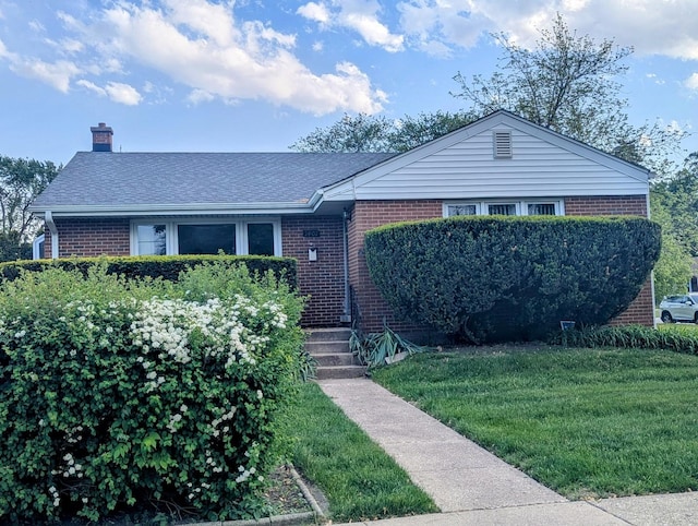 1401 S 6th Ave, Des Plaines, IL 60018 - ranch-style house with brick siding, a chimney, a front lawn, and a shingled roof