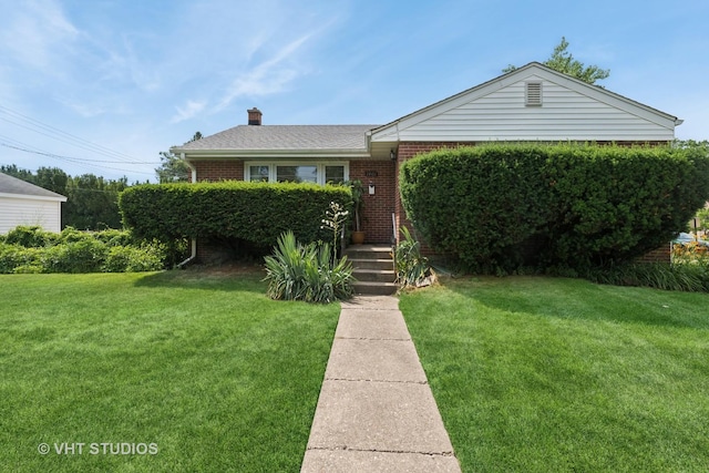 1401 S 6th Ave, Des Plaines, IL 60018 - view of front of house with brick siding, a front lawn, and a chimney