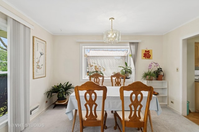 1401 S 6th Ave, Des Plaines, IL 60018 - dining area featuring a chandelier, ornamental molding, and light carpet