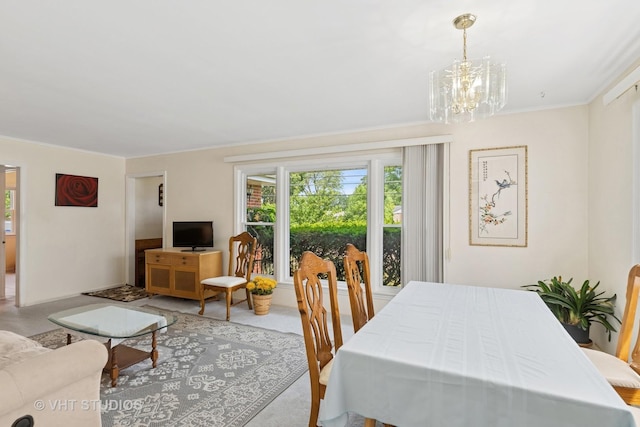 1401 S 6th Ave, Des Plaines, IL 60018 - dining space featuring plenty of natural light, crown molding, and a chandelier