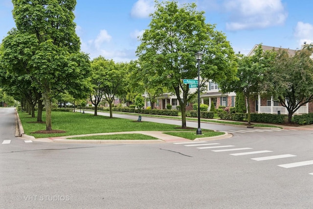 66 N Palazzo Dr, Addison, IL 60101 - view of asphalt street featuring street lighting, curbs, and sidewalks