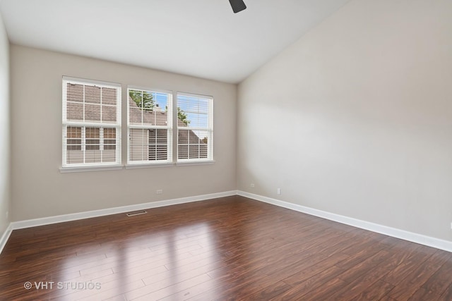 66 N Palazzo Dr, Addison, IL 60101 - spare room with dark wood-type flooring, baseboards, lofted ceiling, and ceiling fan