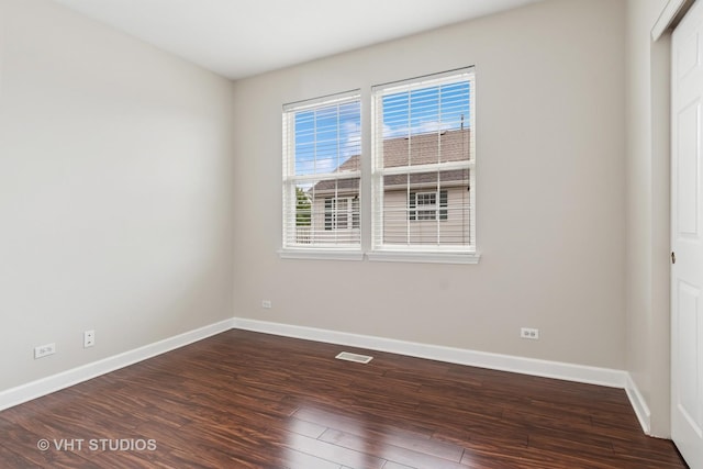 66 N Palazzo Dr, Addison, IL 60101 - empty room with wood finished floors and baseboards