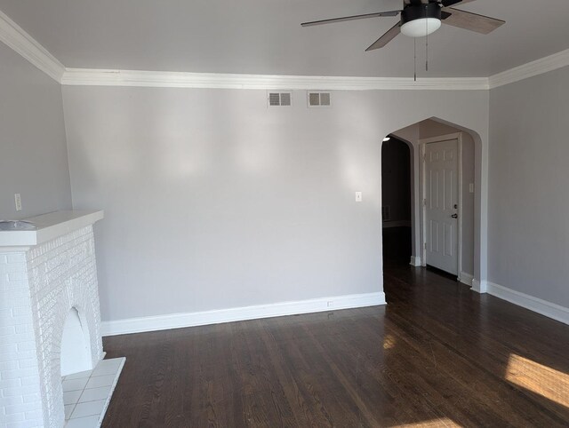 7545 S May St, Chicago, IL 60620 - unfurnished living room featuring arched walkways, ceiling fan, crown molding, baseboards, and dark wood-style floors